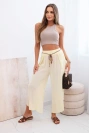 Dámske viskózové nohavice s rozparkom na nohaviciach žltý