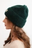Women's winter fluffy hat with decorative button dark green