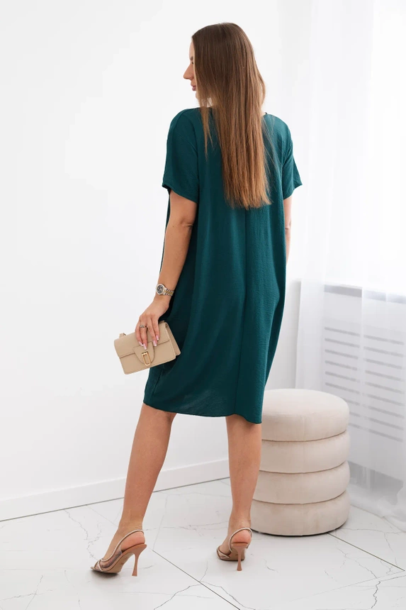 Dress with pockets and pendant dark green