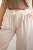 Butter-soft pants with a golden waistband cuff beige