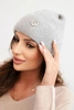 Women's winter fluffy hat with decorative button light gray