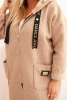 Plus Size women's coat made of faux sheepskin with a hood and pockets camel