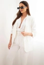 Elegant set of jackets and trousers ecru