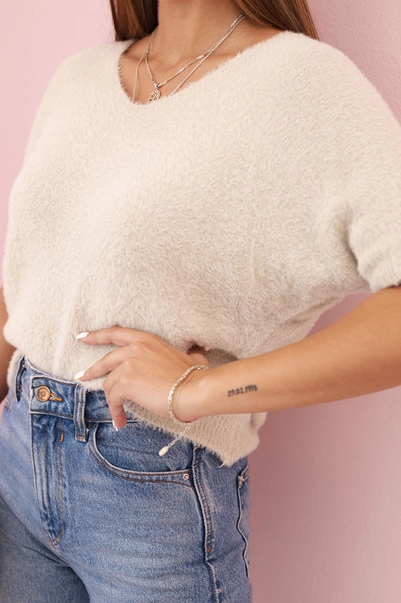 Women's sweater made of soft fluff with a V-neck and short sleeves beige