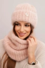 Women's set hat and winter fluffy snood with decorative emblem light powder pink