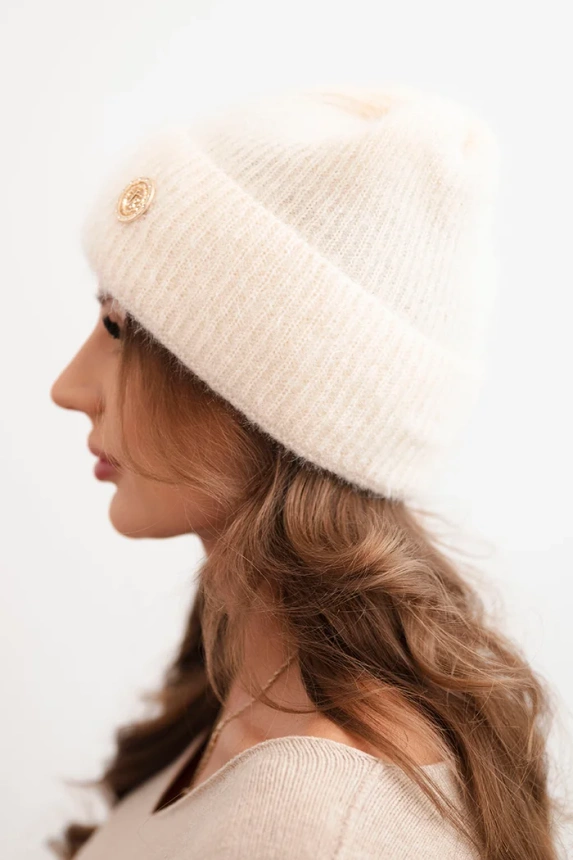 Women's winter fluffy hat with decorative button melon