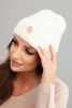 Women's winter fluffy hat with decorative button ecru