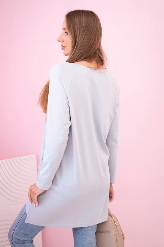 Women's blouse with pockets and decorative print grey