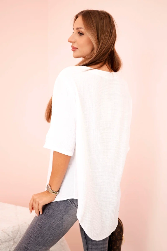 Women's muslin shirt with a button white