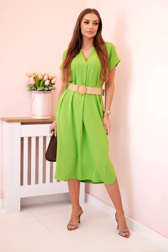 Dress with a decorative belt light green