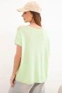 Women's oversized viscose blouse with short sleeves and a round neckline apple green