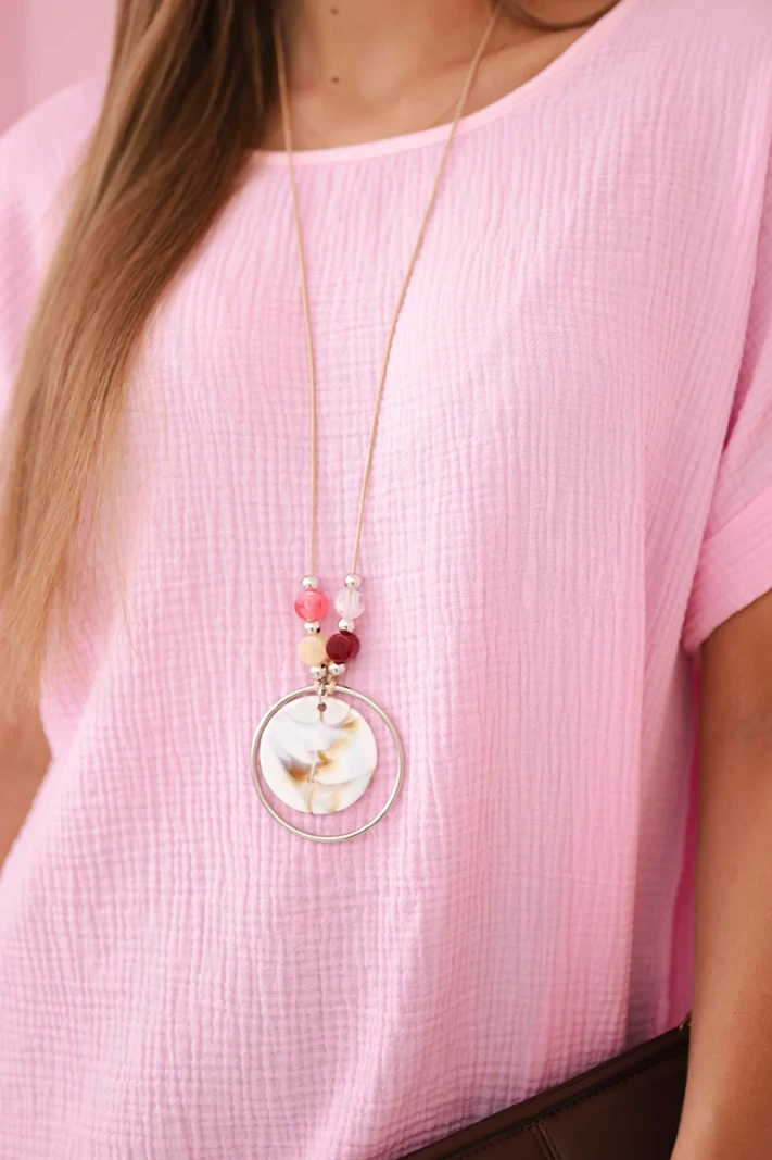 Muslin blouse with a necklace candy pink