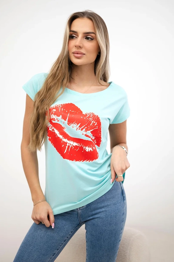 Mintfarbene Bluse mit Lippendruck