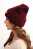 Women's winter fluffy hat with a decorative button burgundy