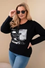 Plus Size women's blouse with a distressed print and longer back black