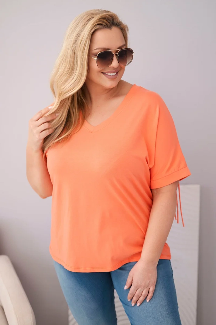 Damen-Baumwollbluse in Plus Size mit V-Ausschnitt und Fransen auf dem Rücken lachsrosa