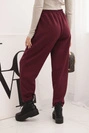 Elegant women's high-waisted trousers with a tie at the waist burgundy