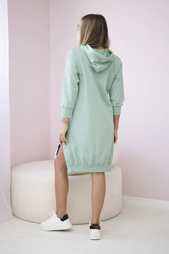 Dress with a hood and longer back dark mint
