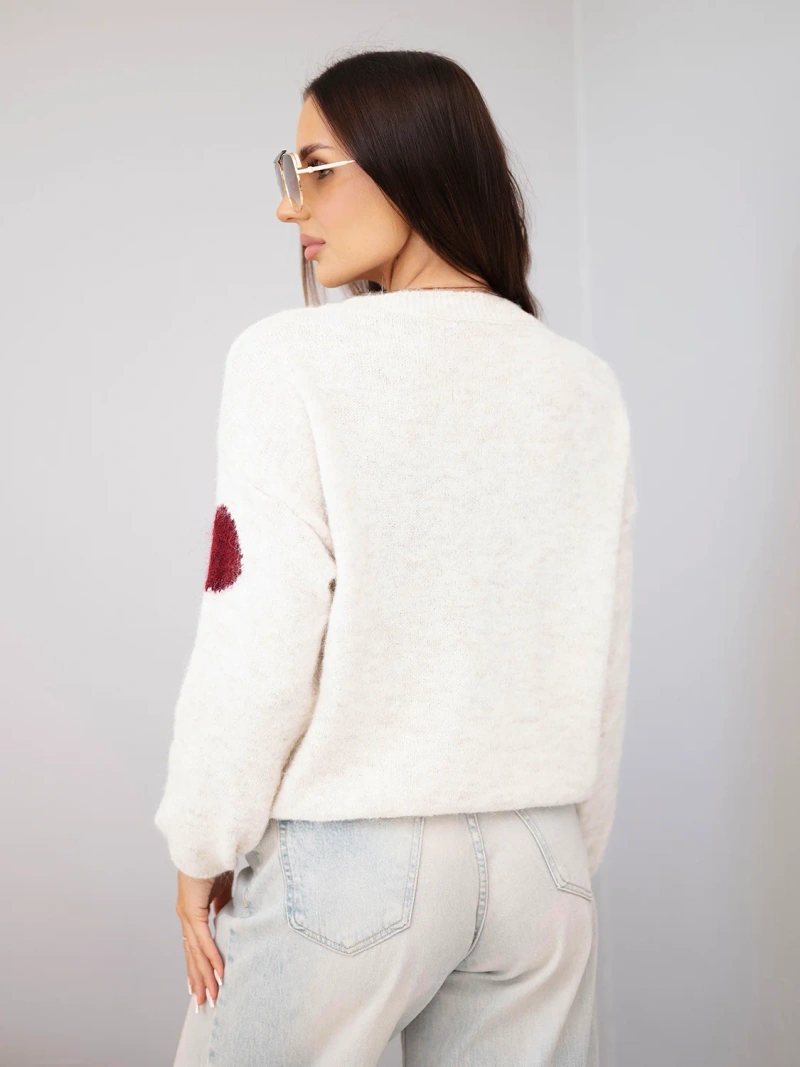 Women's sweater with colorful polka dots and a round neckline beige light