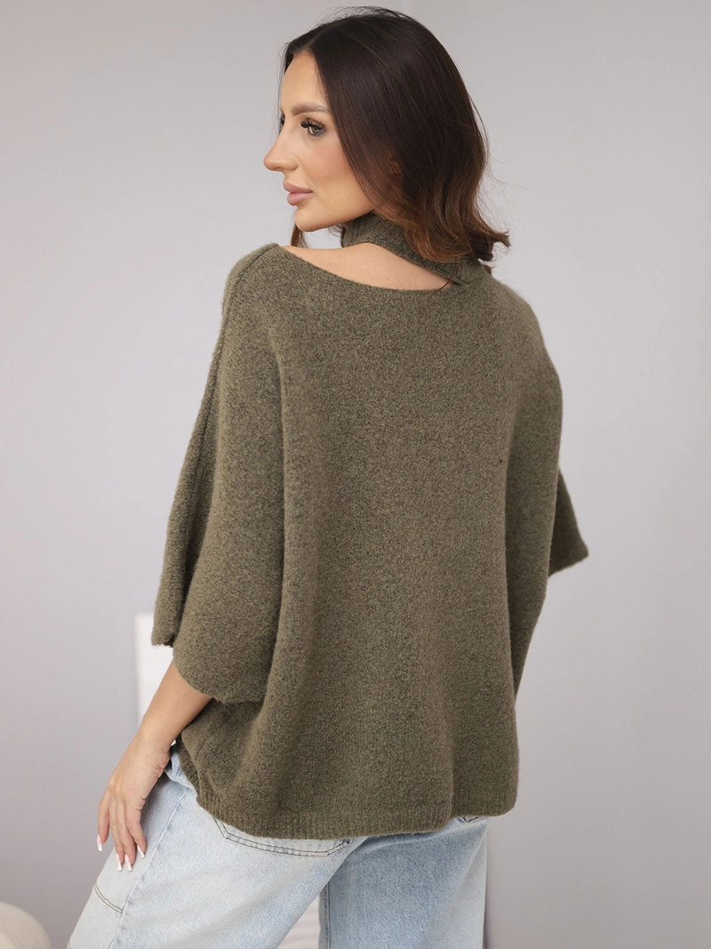 A sweater women's oversize with asymmetric neckline and turtleneck khaki