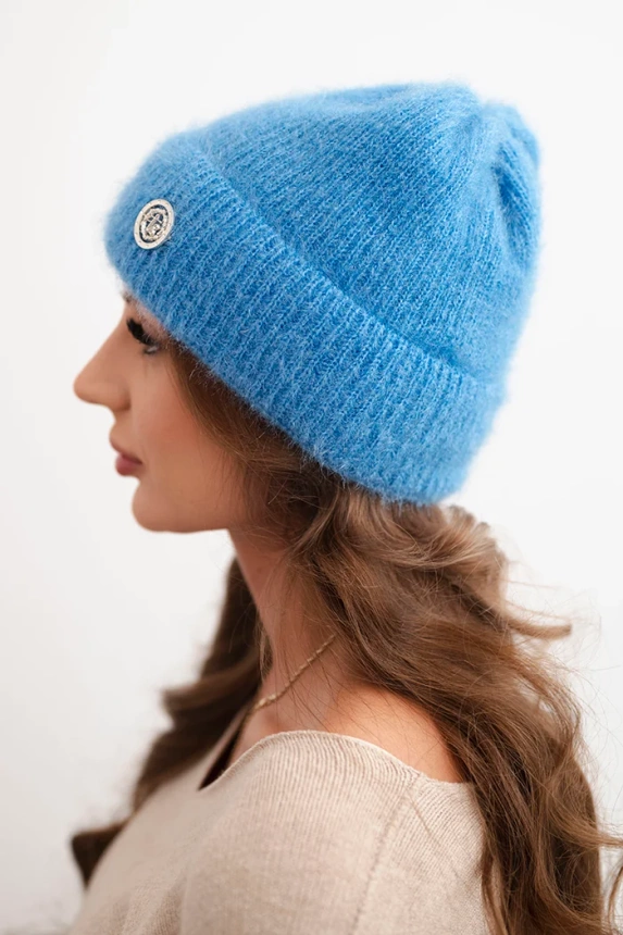 Women's winter fluffy hat with decorative button turquoise