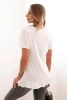 Women's blouse with a ruffle at the bottom white