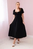Ruffled dress with a tie at the neckline black