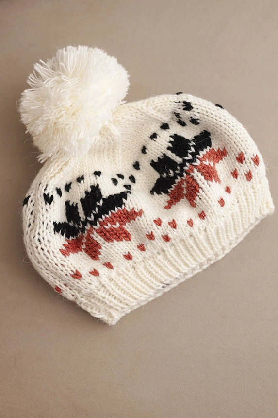 Women's winter wool hat with snowflake motif and pom-pom K457 ecru
