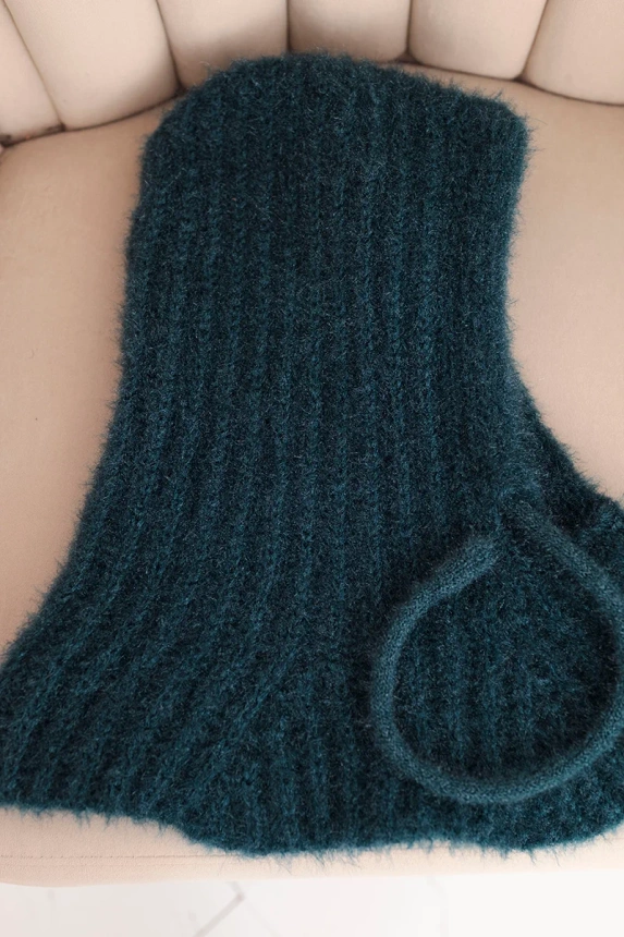 Women’s hooded cap with a delicate weave and drawstrings teal