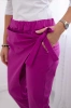 Trousers tied with an asymmetrical front plum