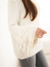 Women's sweater with fringes on the sleeves and a round neckline beige