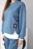 Women's set with a loose sweatshirt and sweatpants denim melange
