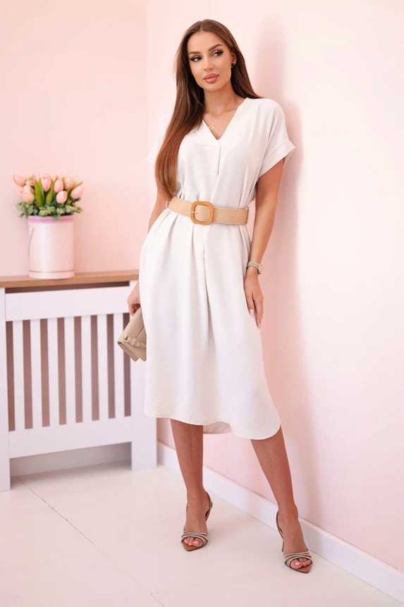 Dress with a decorative belt beige