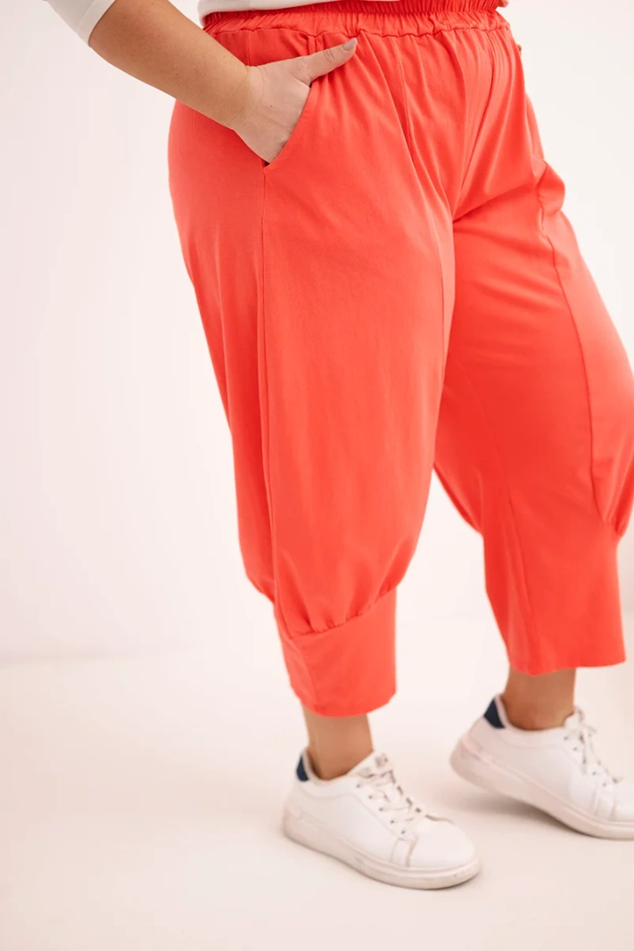 Dámske nohavice Plus Size s nízkym krokom a gumou v páse koralové