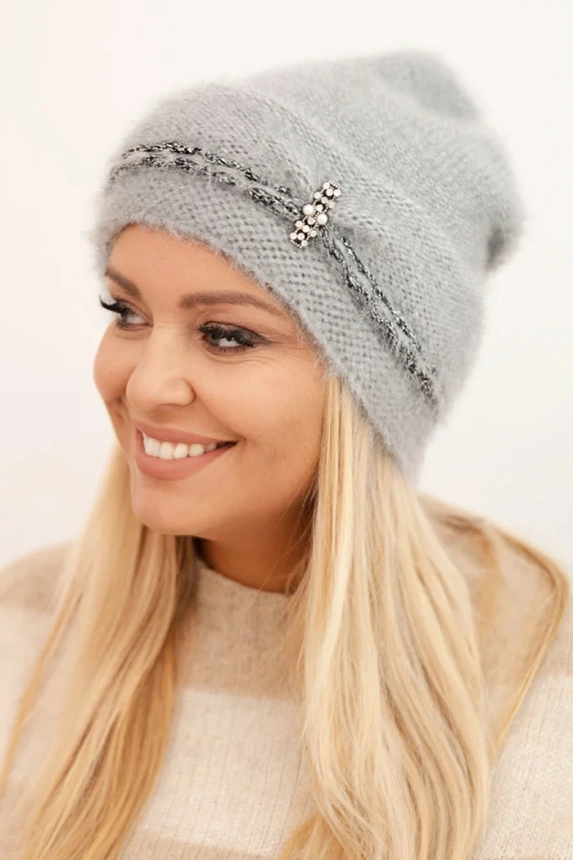 Women's winter fluffy hat with pearls and decorative braid gray