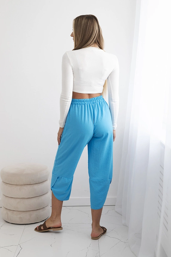 Trousers with wide leg and pockets turquoise