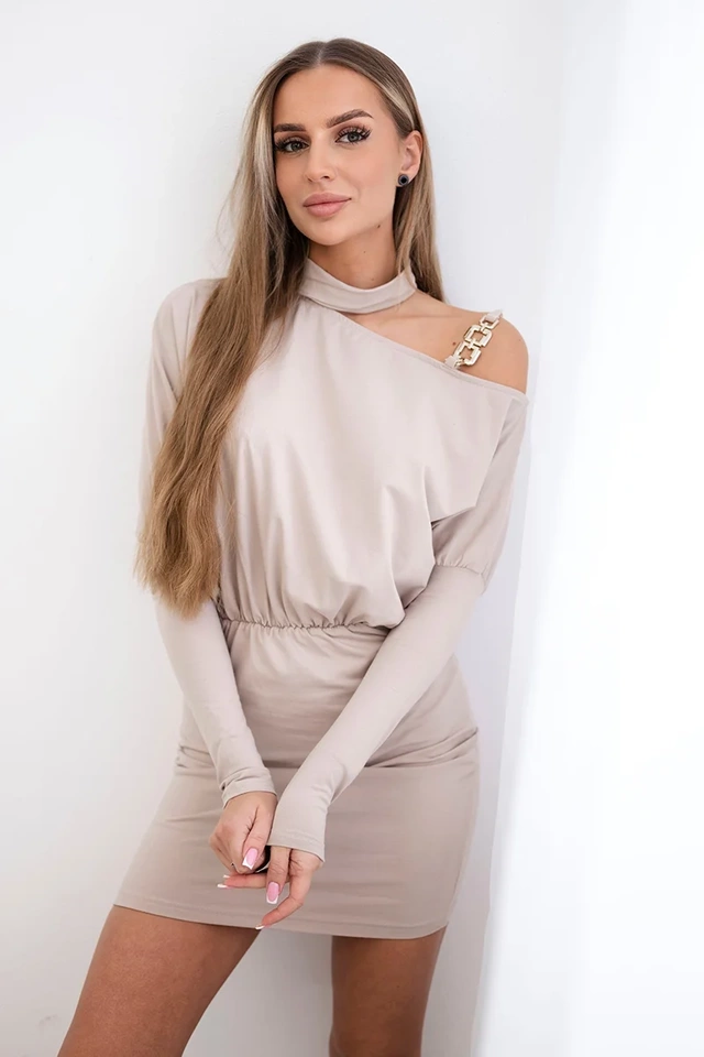 Dress with decoration on the shoulder beige