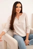 Women's cotton blouse with long sleeves and buttons at the neckline beige
