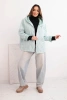 Women's spring quilted jacket with a hood and zipper light mint