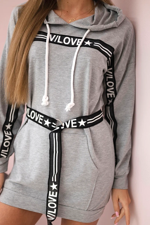 Dress decorated with tape with inscriptions gray