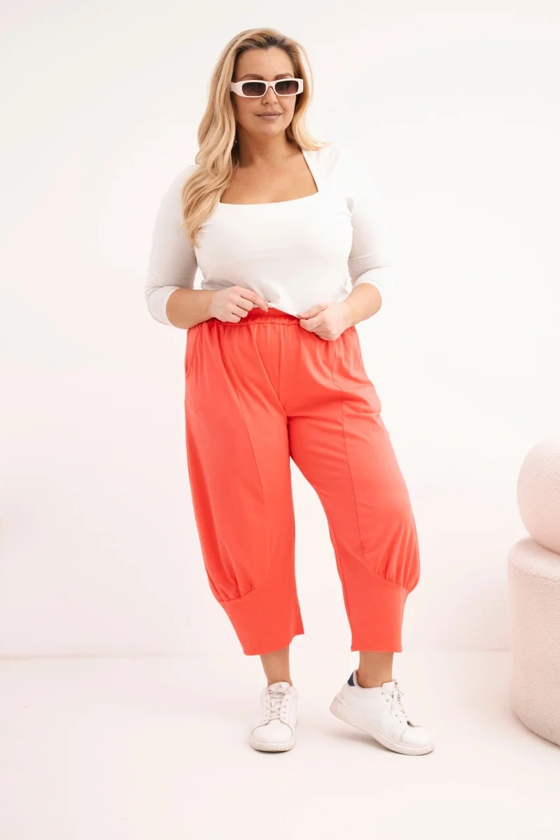 Spodnie damskie Plus Size z obniżonym krokiem i gumką w pasie koralowe