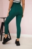 Creased trousers dark green