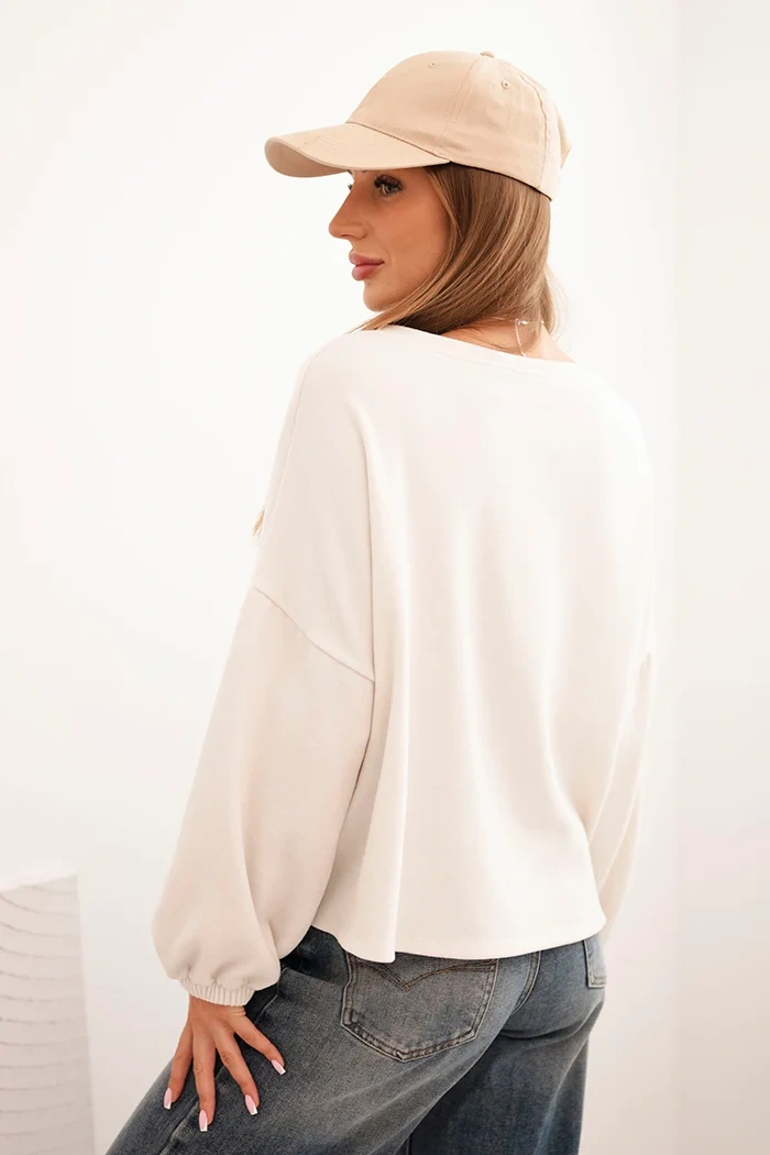 Women's sweatshirt with decorative finishing at the bottom ecru