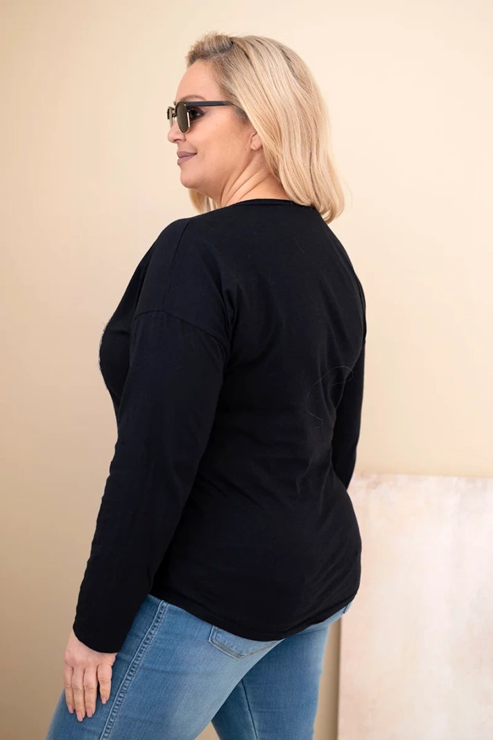 Plus Size women's blouse with a distressed print and longer back black