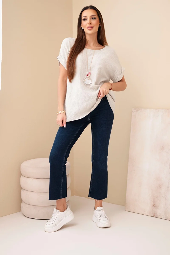 Muslin blouse with a necklace beige