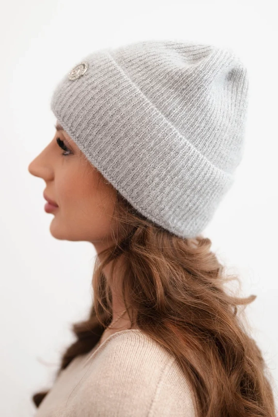 Women's winter fluffy hat with decorative button light gray