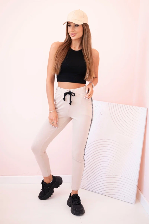 Women's sweatpants with side stripes and drawstring waist beige