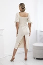 Dress ruffled at the back with tied sleeves beige