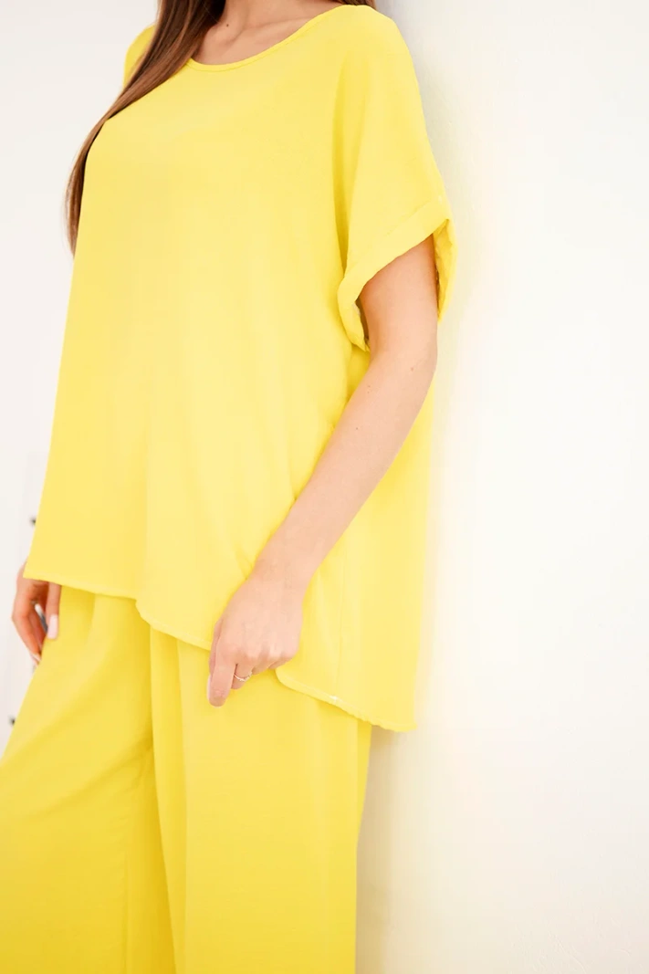 Komplet damski Plus Size bluzka i spodnie z szeroką nogawką żółty