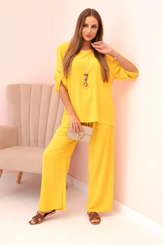 Women's set with a blouse with a necklace and wide pants yellow